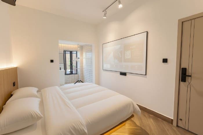 Comfortable King Room with Giant Screen Projector
