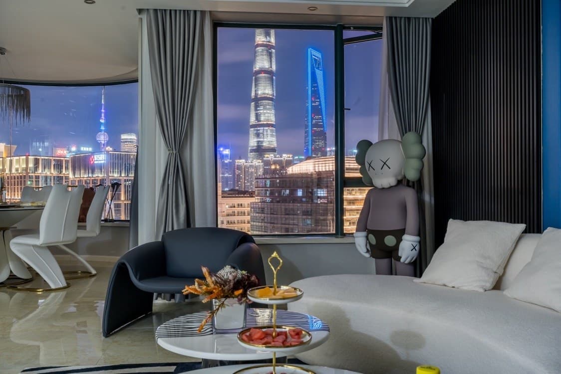Floor-to-ceiling windows with panoramic river views