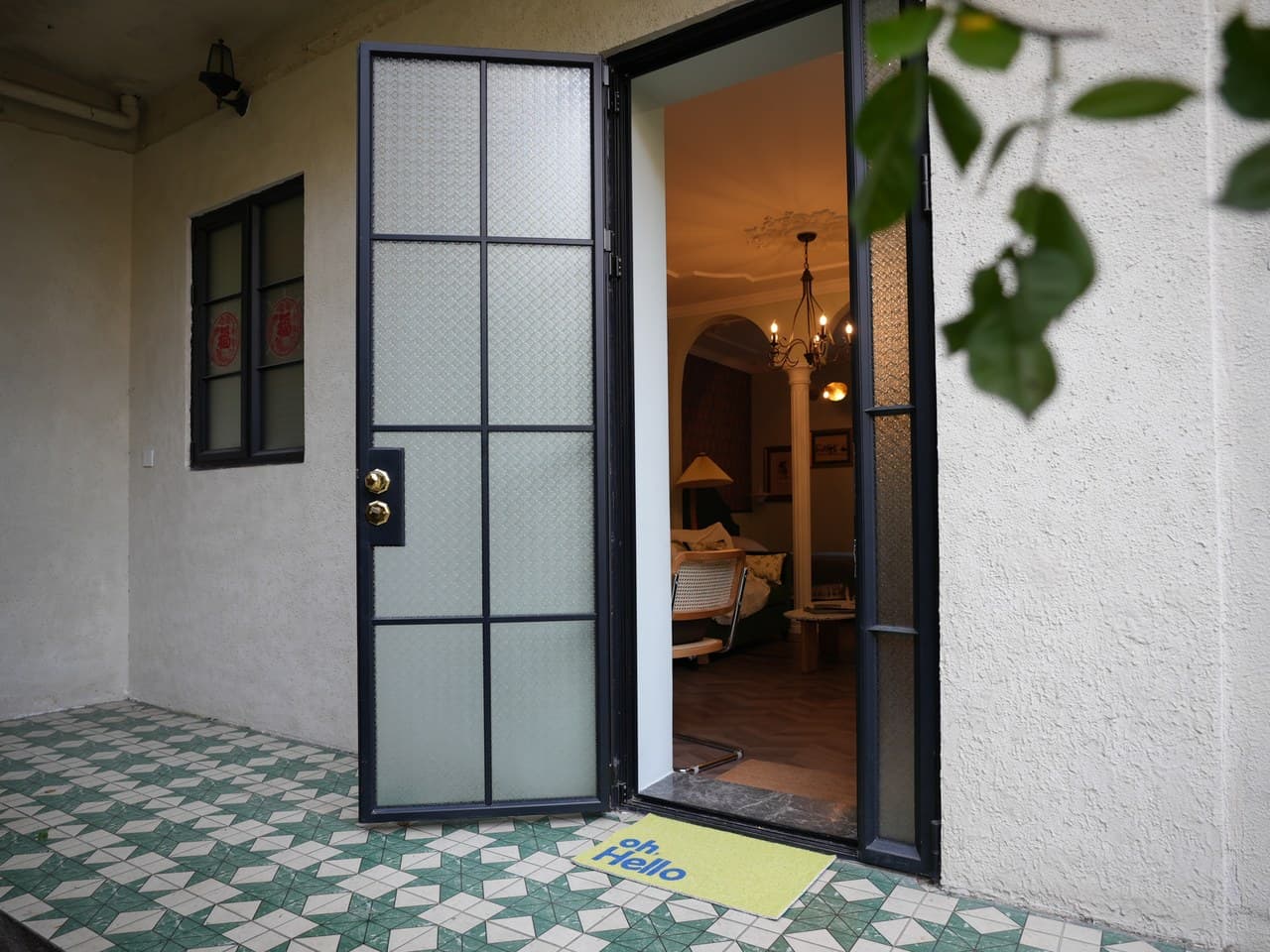 The ground floor has a separate entrance and an open courtyard.