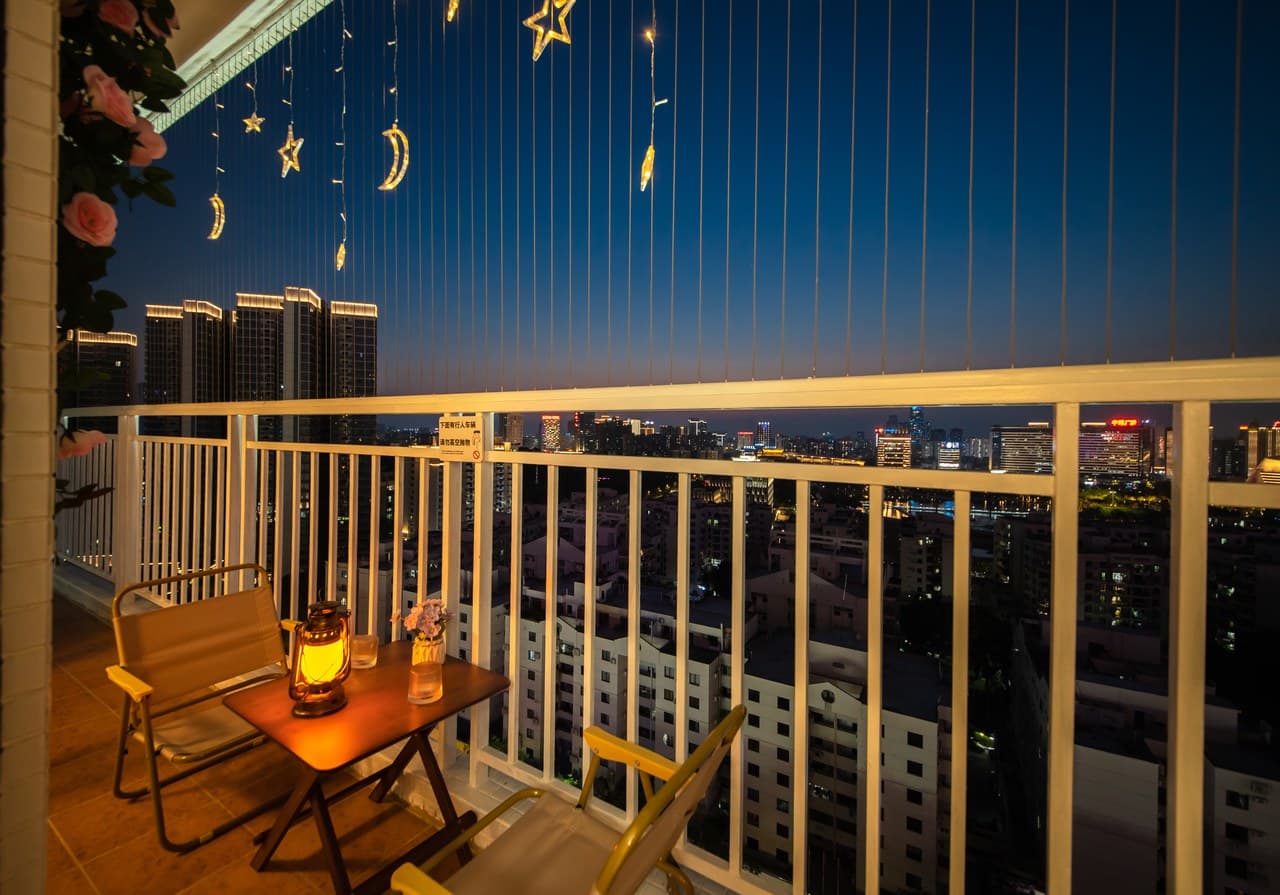 Commercial dining options with unobstructed city night views from the balcony.