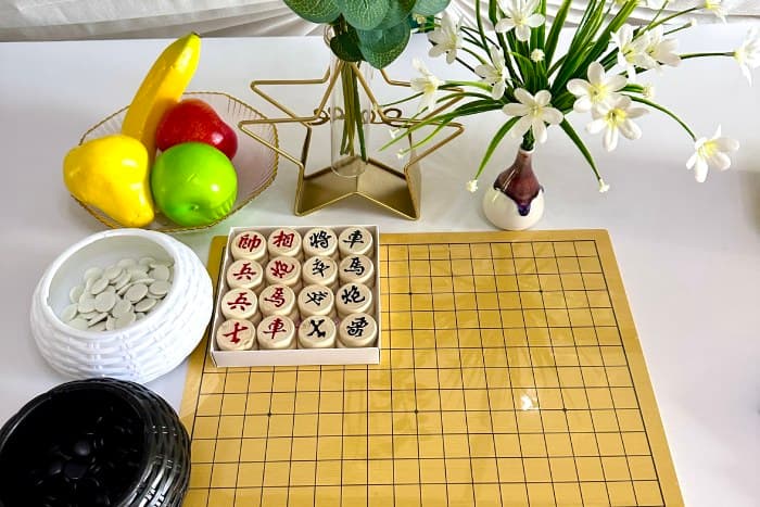 Chess, Go, and Gomoku.