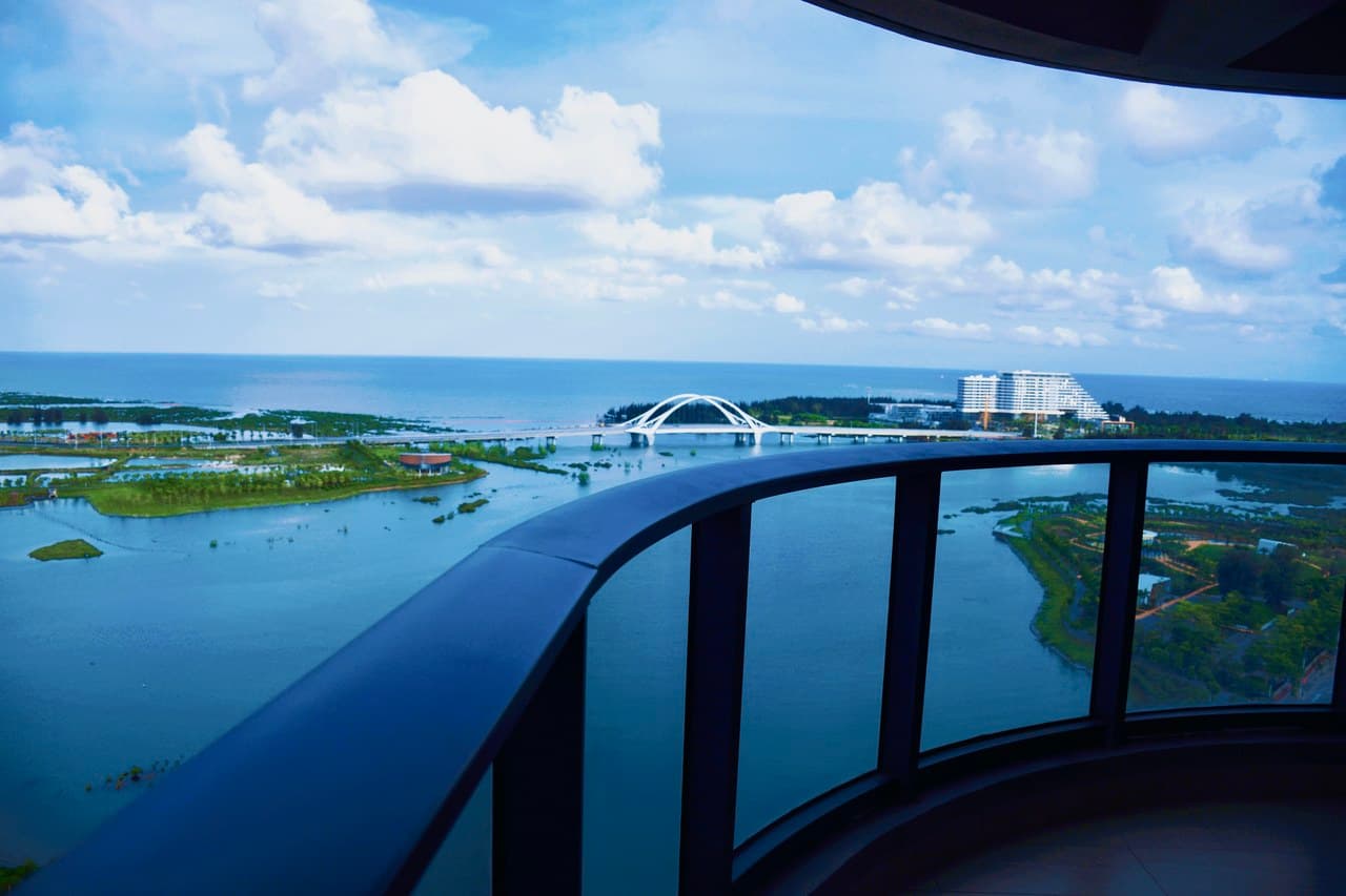 A circular balcony offers unobstructed views of the sea.