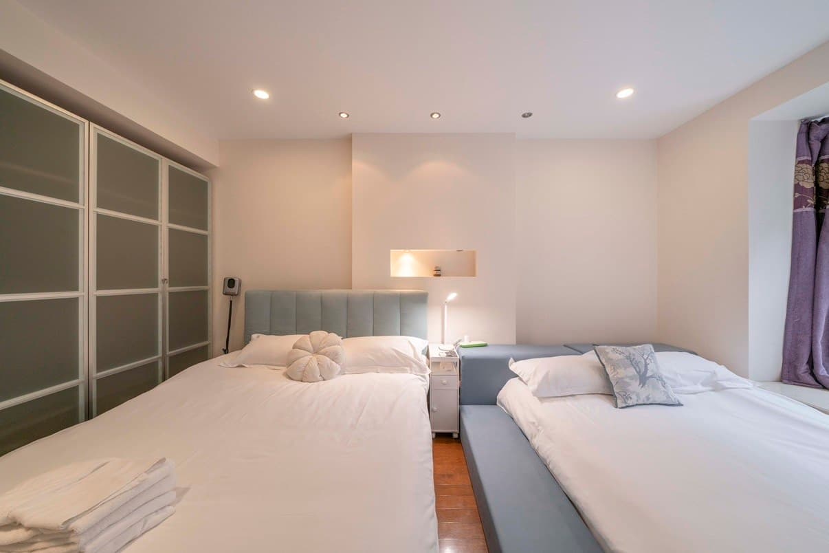 Three large rooms with five beds