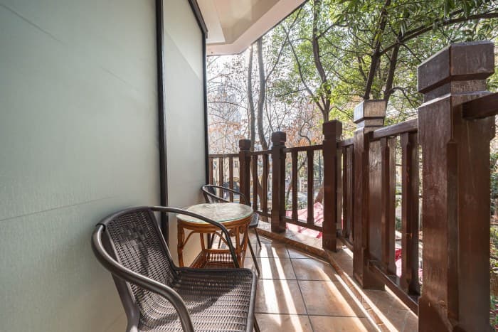 Second floor balcony, room 203.